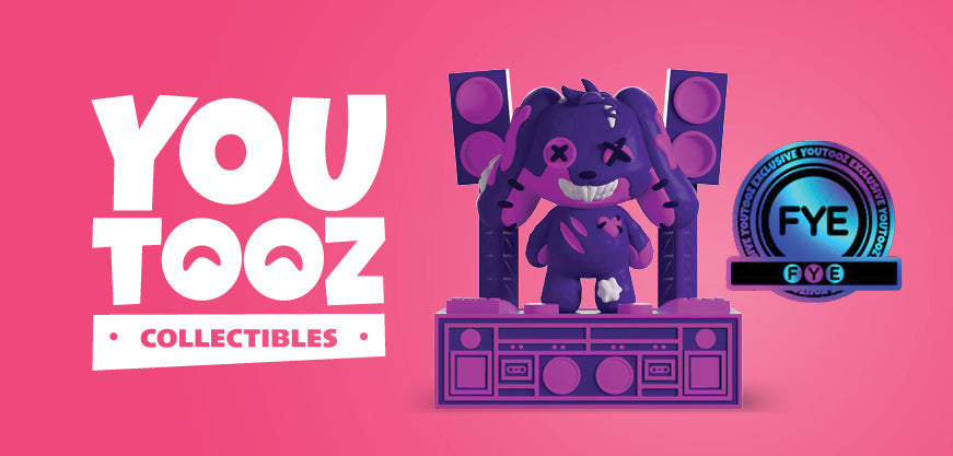 Purple collectible figure on a pink background with 'YOU TOOZ' branding and FYE logo.